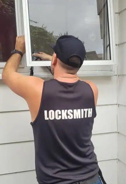 Locksmith fixing hinged window problem